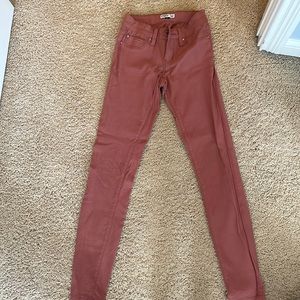 Dark coral jeans